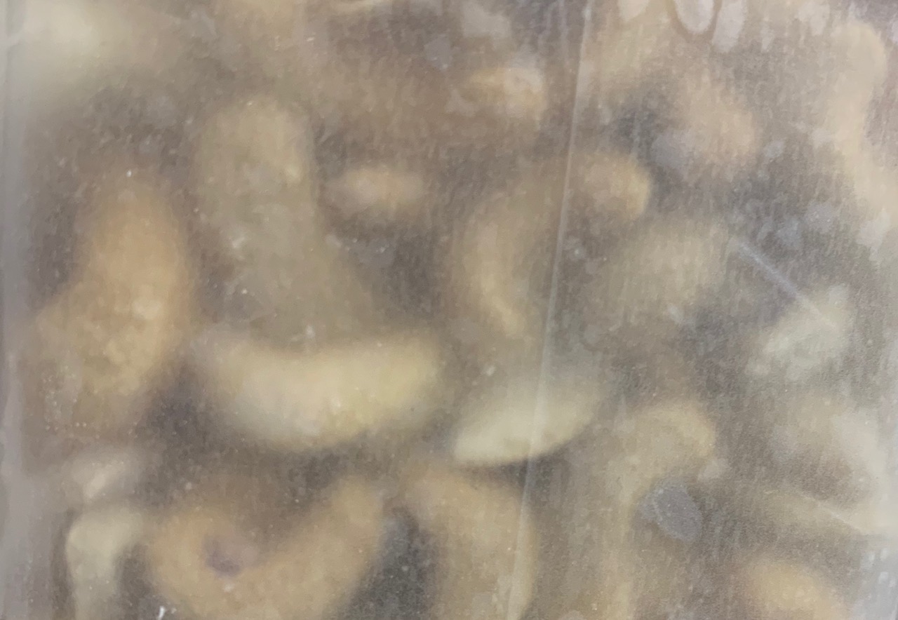 see through label picture with peanuts behind the film
